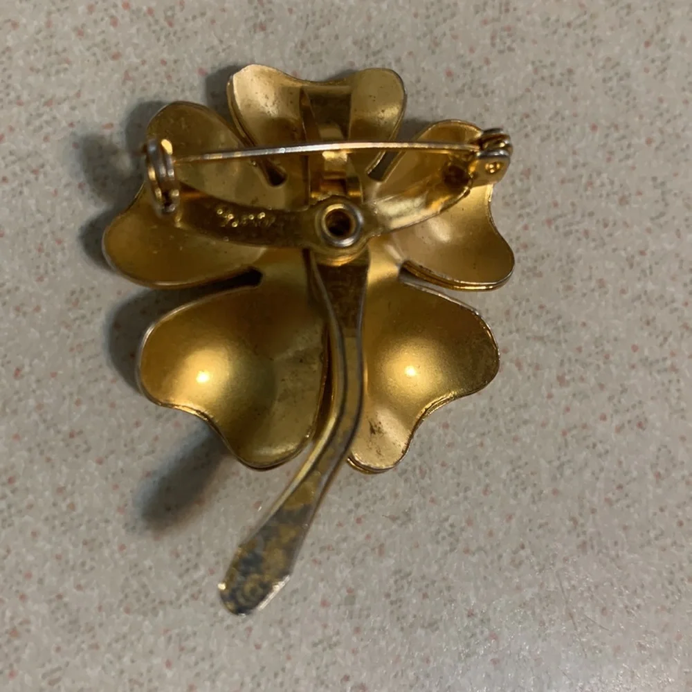 Vintage Coro gold tone purple rhinestone flower broach/Slide (268)